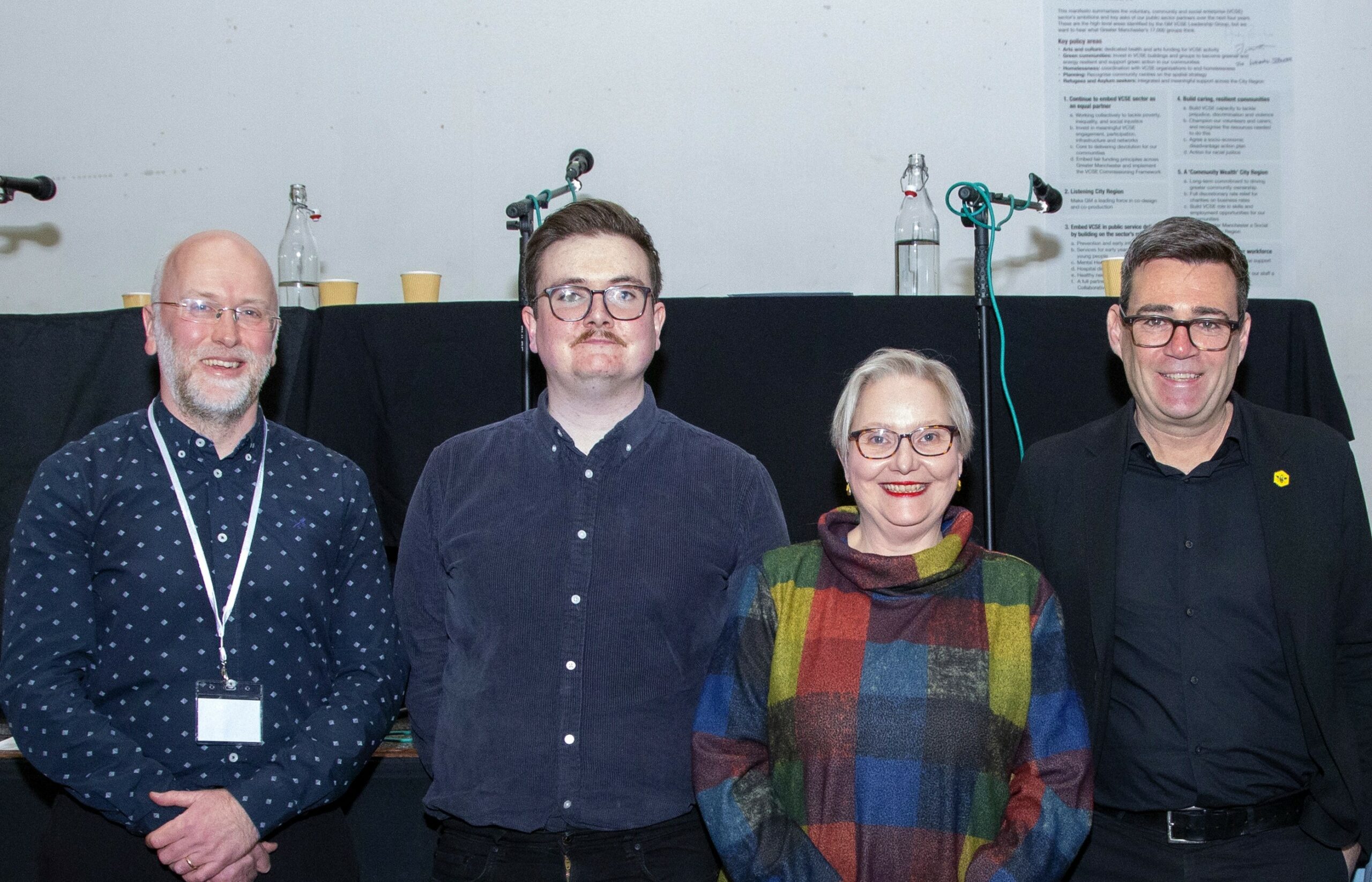 photo of event chair and candidates lined up post-event. Ben Gilchrist, Jake Austin, Astrid Johnson and Andy Burnham